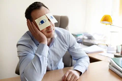 Man, sticky notes and sleeping in office, exhausted and professional Stock Photos