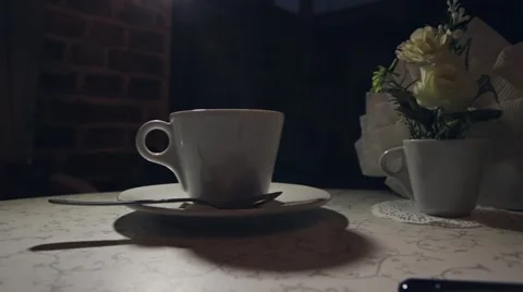Man stirring coffee, close-up, shallow DOF Stock Footage 60604497