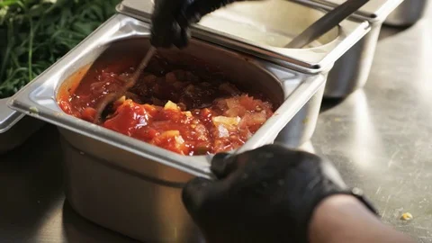 Man Stirring Sauce Stock Footage 71550874