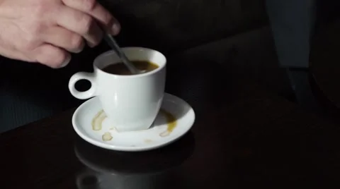 Man Stirs Coffee 库存影片 53251760