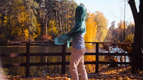 A man with a stole in his hands dancing on the bridge alone 動画素材 97285508