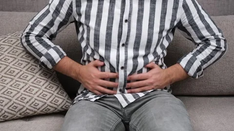 Man stomach pain Stock Footage 259629588