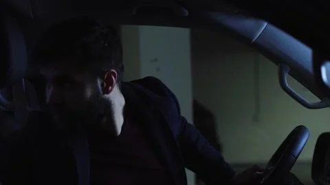 Man stopped by police after using his mobile phone while driving his car Stock Footage 144688347
