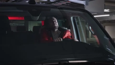 Man stopped by police after using his mobile phone while driving his car Stock Footage 144688409