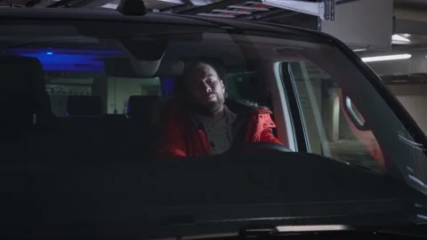 Man stopped by police after using his mobile phone while driving his car Stock Footage 144688446