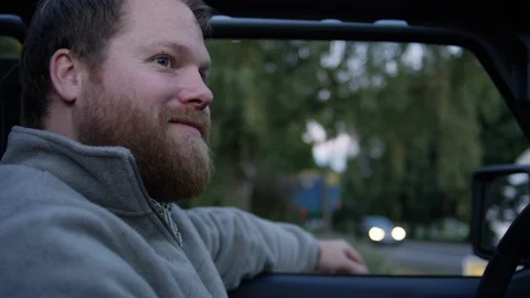 Man Stops At Intersection In Rural Area, He Turns Left, Slow Motion Stock Footage 96807494