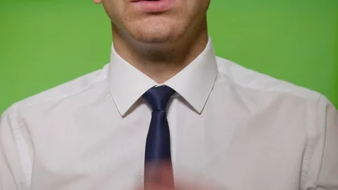 Man straightens his tie Stock Footage 113471349