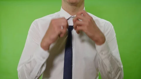 Man straightens his tie Stock Footage 113471410
