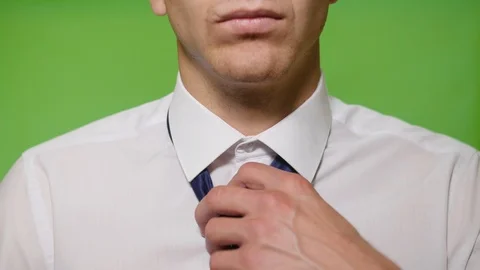 Man straightens his tie Stock Footage 113471413