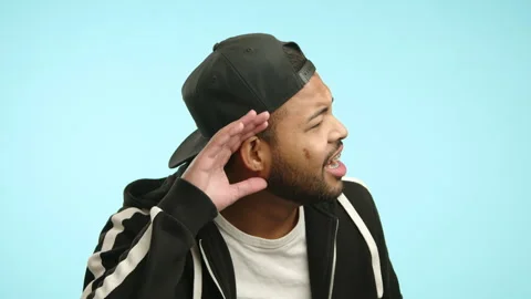 Man Straining to Hear, Hand Cupped Behind Ear Stock Footage 269822854