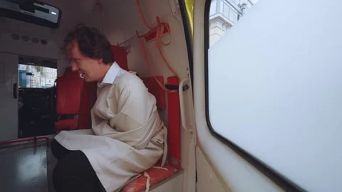A man in a straitjacket escapes, the escape of a mentally ill person Stock Footage 286101249