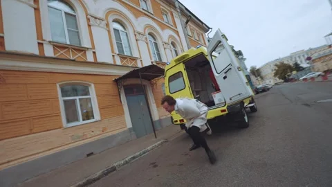 A man in a straitjacket escapes, the escape of a mentally ill person Stock Footage 286101623
