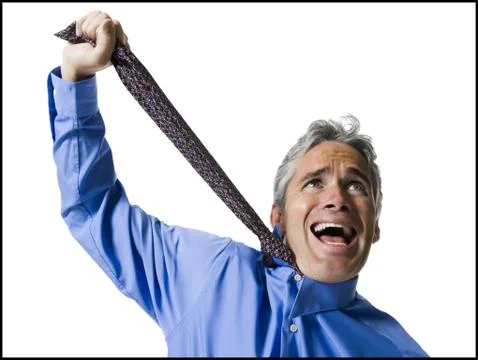 Man strangling himself with necktie Stock Photos