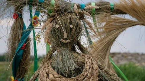 A man of straw is stirring from the wind Stock Footage 93391923