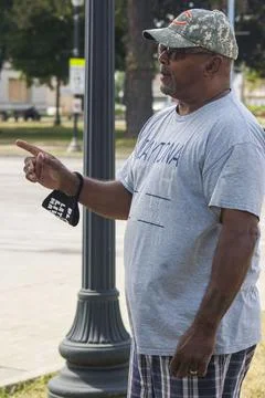 Man on a street corner Stock Photos