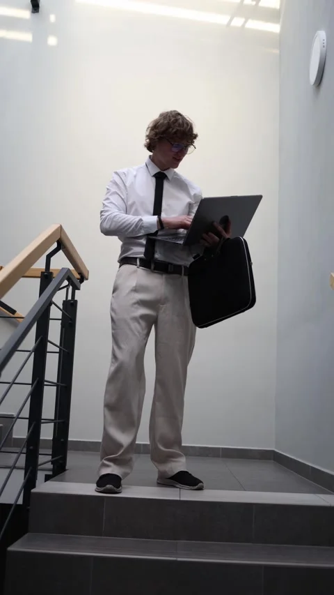 Man stressed while working on laptop 스톡 동영상 333511669