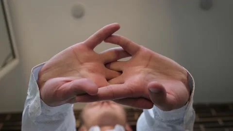 Man stretching his hands during the working day. A man cracks his knuckles Stock Footage 215016354