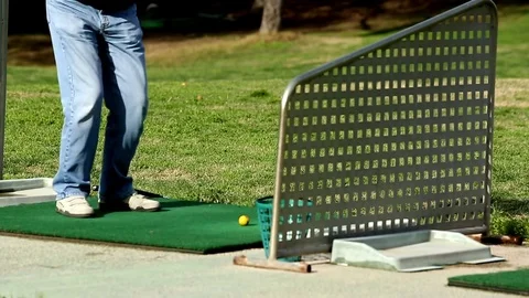 Man strikes a golf ball Stock-Footage 75216935
