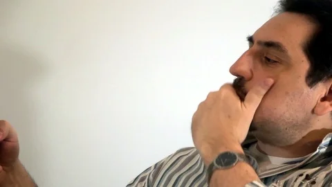 A man strokes his beard Stock Footage 93097726