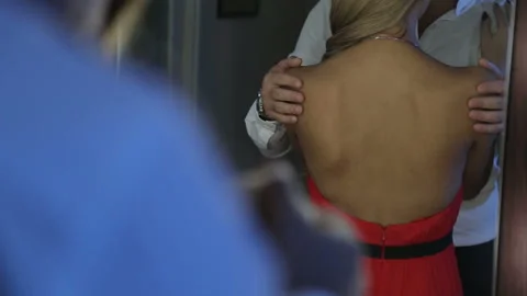 A man stroking a girl on the back  스톡 동영상 146880063