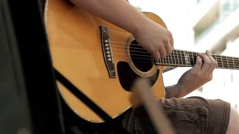 Man Stroming Guitar (Slow Motion) Stock Footage 100034116