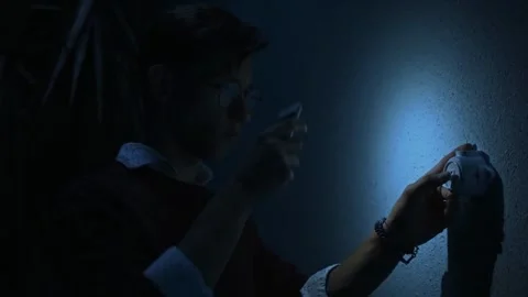 Man Struggles to Restore Light Amid Sudden Power Loss Stock Footage 314303507