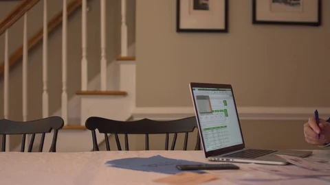 A man struggling with his bills Stock Footage 70257200