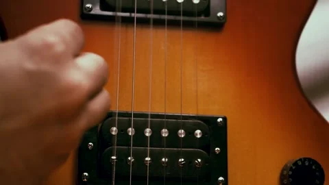 Man Strums Guitar Stock Footage 300885394
