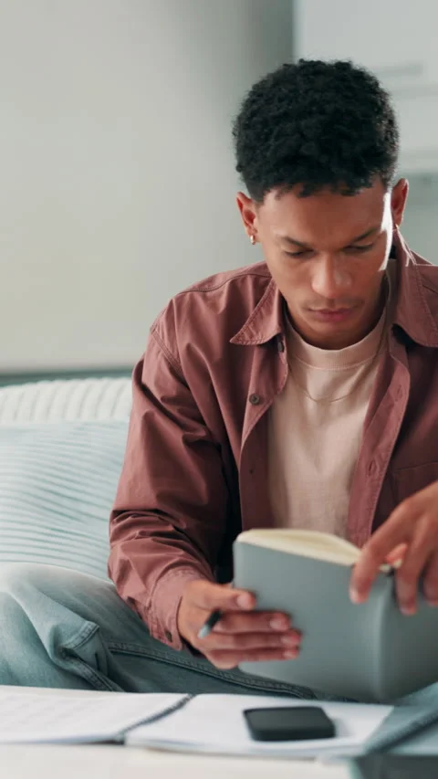 Man, student and studying with notebook in home for accounting course, finance Stock Footage 321397876