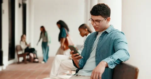 Man, student and typing with mobile phone on campus, college portal and easy Stock Footage 346462725
