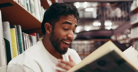 Man, student and yawn with reading book in library with research project, tired Stock Footage 335793217