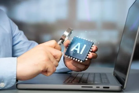 A man studies an AI chip on a computer. High technology and advanced artifici Stock-Fotos