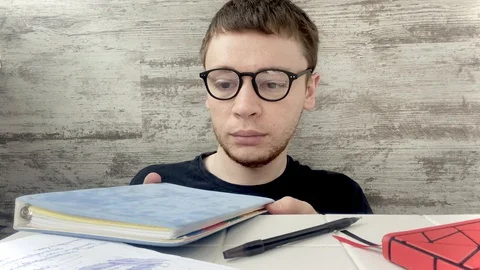 Man studies and works Stock Footage 128982054