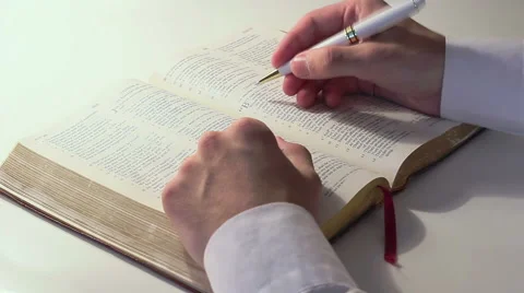 Man Studies The Bible 2 Stock Footage 49981352