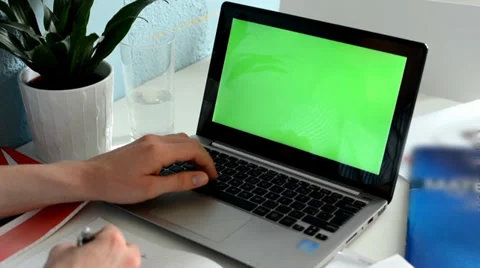 Man studies (learns) and works on the computer (green screen) Video stock 37345851