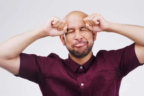 Man, studio and crying or upset for job in education, teacher with comedy or Stock Photos