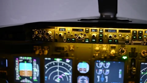 A man is studying to be a pilot in a flight simulator. Close-up of male hands on Stock Footage 235768427