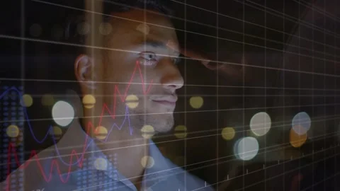 Man studying glass, touching screen as incoming finance graphs and % values Stock Footage 333594831