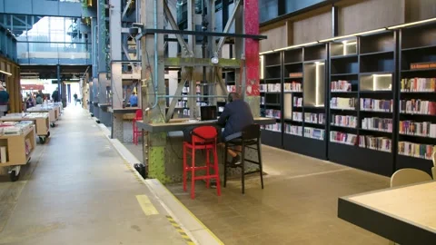 Man studying in library Stock Footage 240180611