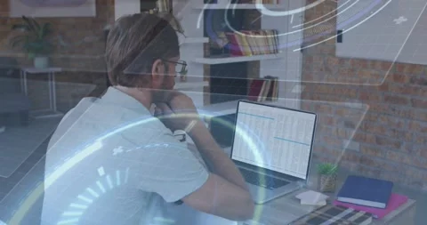 Man studying spreadsheet on laptop on opening file, HUD sweeping, highlighting Stock Footage 331832989
