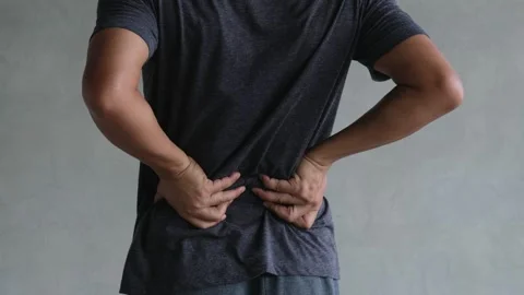 Man suffering from back pain, have a backache Stock-Footage 188430357