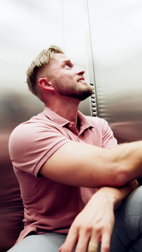 Man Suffering From Claustrophobia Trapped Inside Elevator Stock Footage 246571457