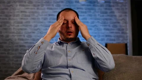 Man suffering headache at home Video stock 149065302