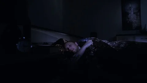 A man is suffering from insomnia, he couldn't sleep Video stock 84741152