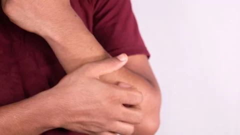 Man suffering from itching skin, close up. Stock Footage 142359208