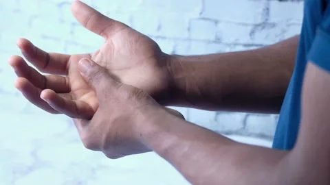 Man suffering pain in hand close up Stock Footage 142145672