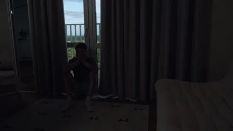 Man suffering from panic attack alone at home, holding head in despair. Mental Stock Footage 312277541