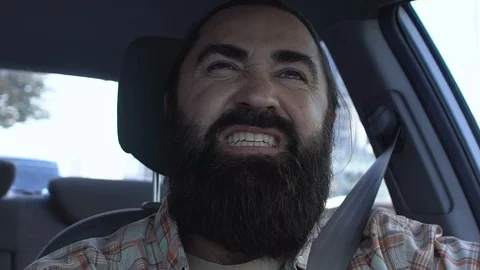 Man suffering sharp tooth pain in auto, sensitive gums problem, stomatology Stock Footage 117220089