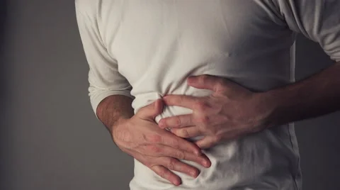 Man suffering from stomach ache Vídeos de archivo 60051463