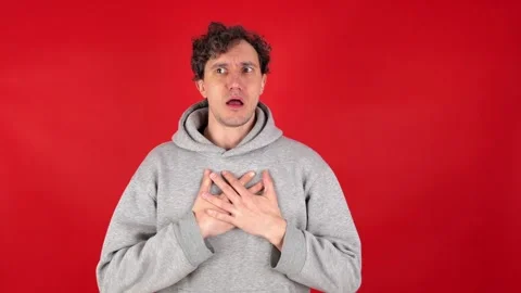 Man suffers from asthma attacks, gasps, holds chest hands fear in eyes. Видео 304745941